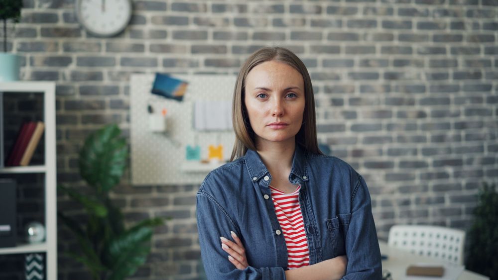 Creative professional in a brick-wall office